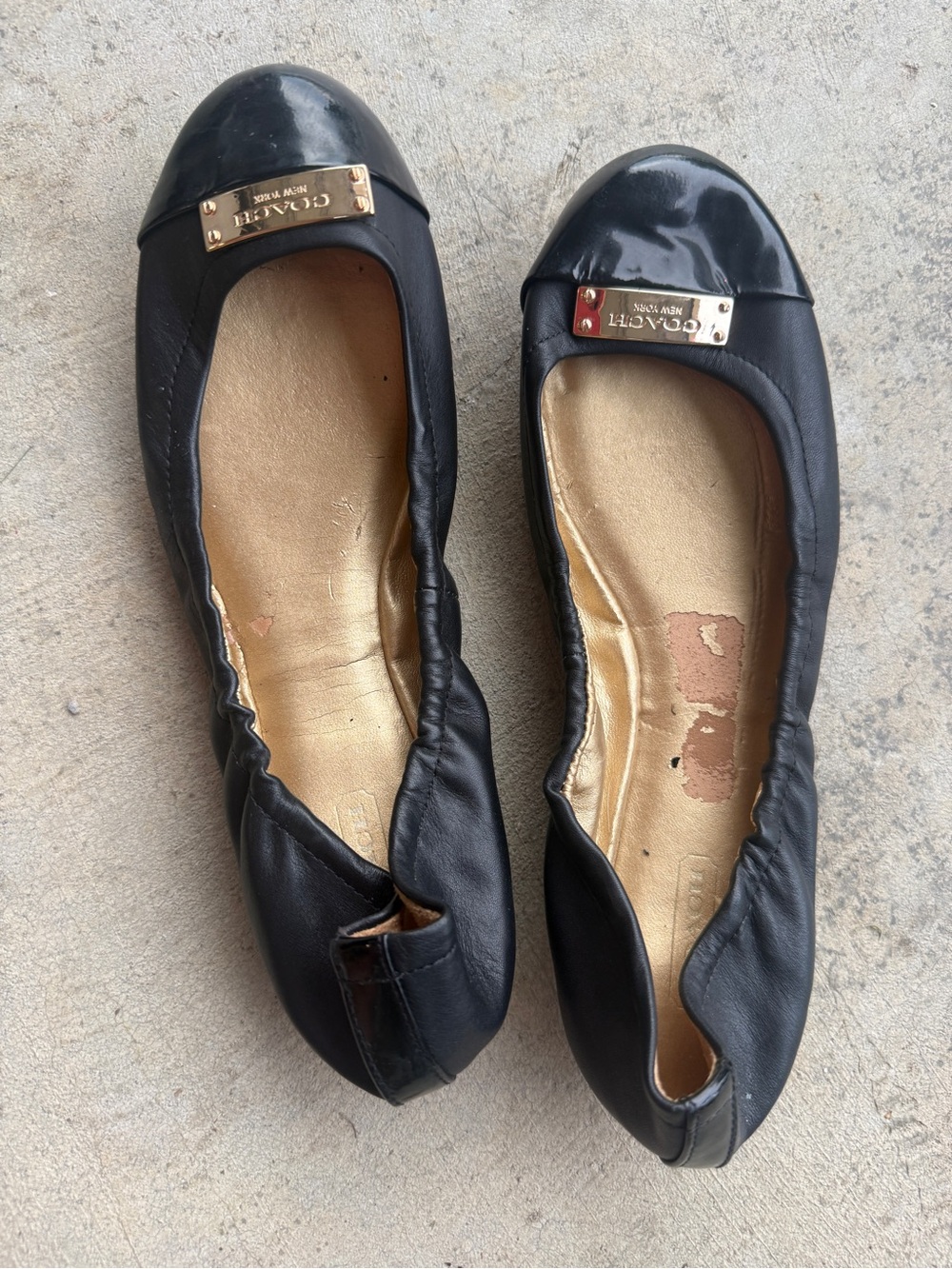 Coach Black Leather Ballet Flats with Gold Tone Plaque